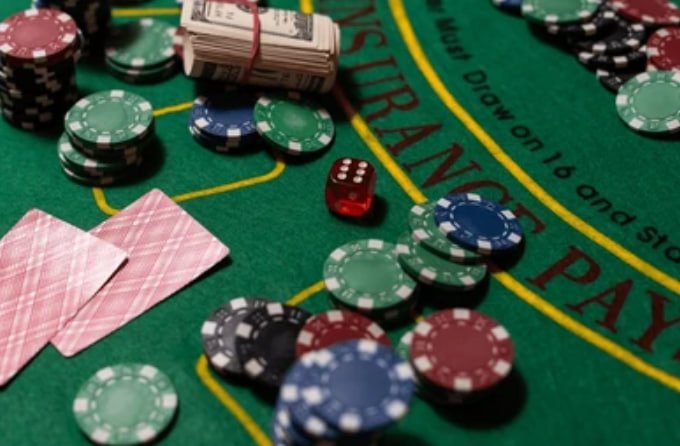 Mobile phone showing demo olympus Macau Pools blackjack interface with betting controls and live croupier feed